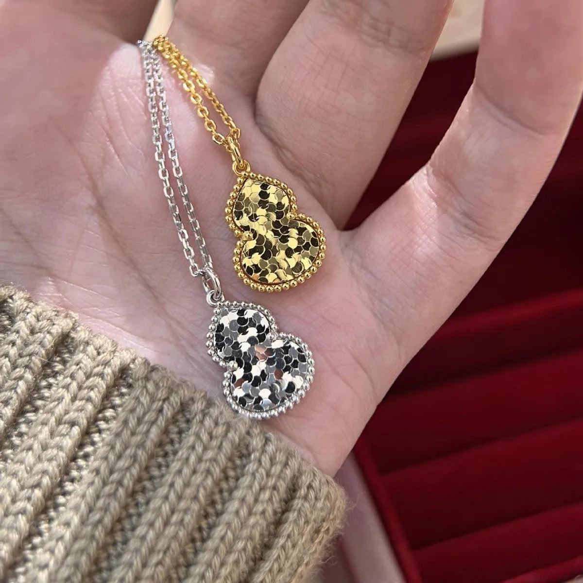 Gourd double-sided clavicle chain necklace in gold and silver options on display