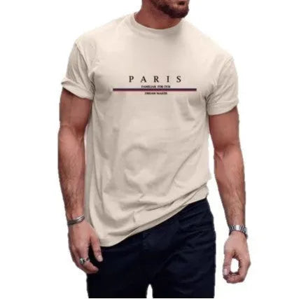 Man wearing a loose-fitting short-sleeved pure cotton t-shirt with a printed design in apricot colour.