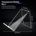 Clear acrylic mobile phone stand on a desk with a smartphone placed in it, showing the universal fit and transparent design.