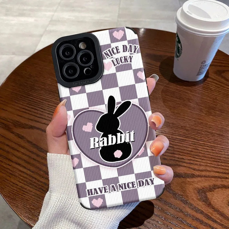 Cartoon creative TPU phone case for iPhone 11-14 Pro Max with black background and checkerboard bunny design