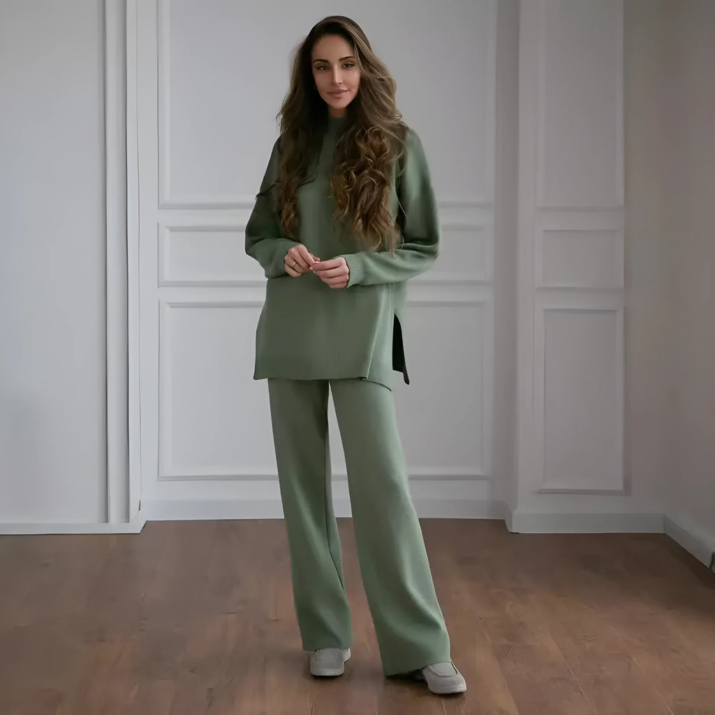 Women's turtleneck knit sweater suit set in solid colour with long sleeves and matching trousers on display