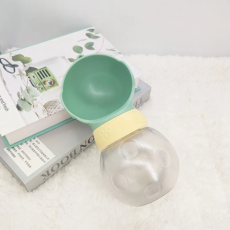 Portable dog water bottle with leak proof bowl and food storage in green, 380ml capacity