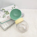 Portable dog water bottle with leak proof bowl and food storage in green, 380ml capacity
