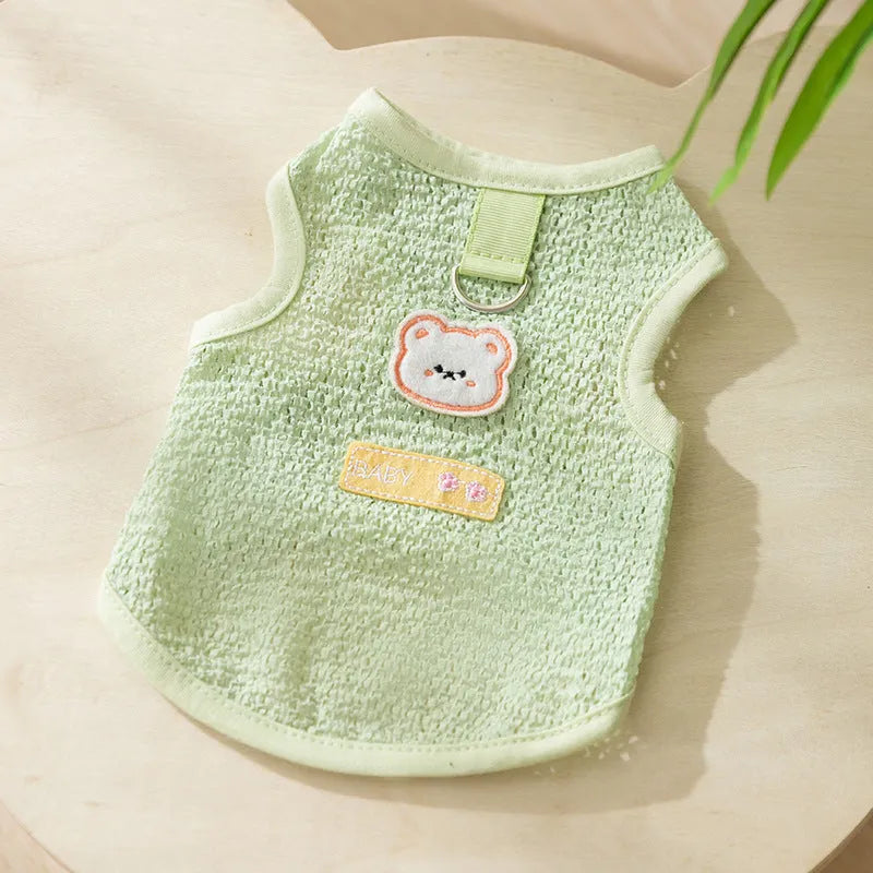 Green knitted cat clothes with a hollowed-out bear patch cartoon design.