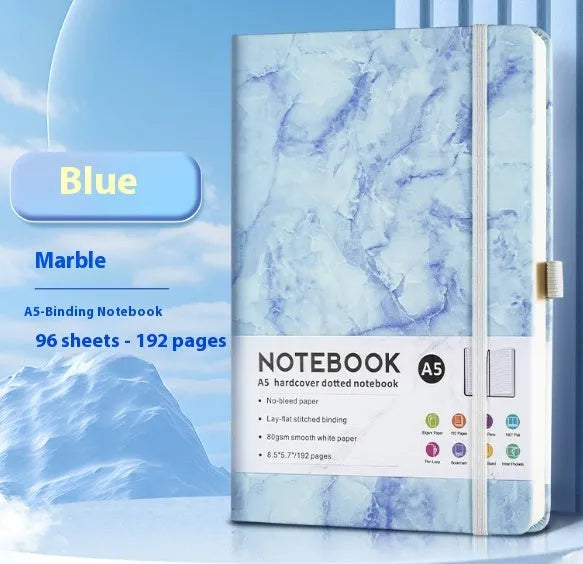 A5 soft touch PU leather strap diary open showing lined pages, closed with elastic band, in a choice of colours.