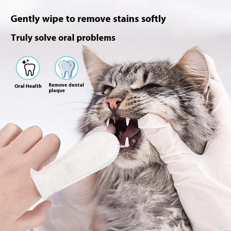 Pack of 50 white non-woven fabric finger cots for cleaning pet teeth on cats and dogs.