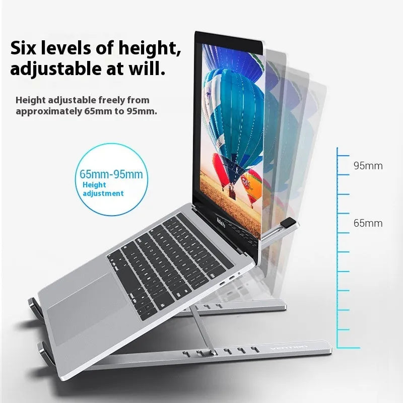 Silver aluminium alloy adjustable laptop stand on a desk with a notebook on top