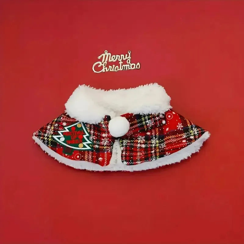 Red festive pet scarf with bell print draped on a dog's neck for winter and Christmas.