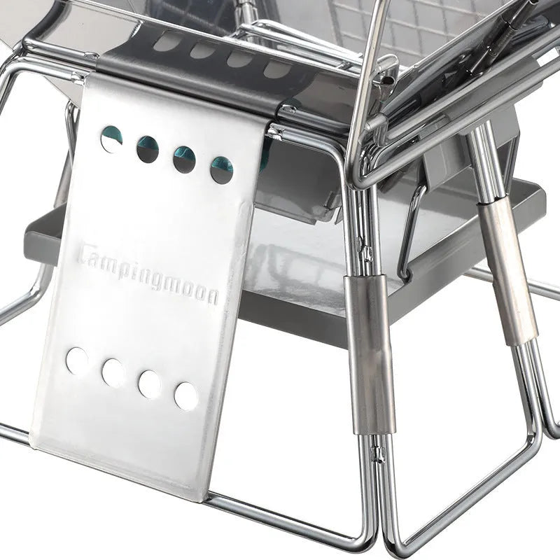 Silver portable folding stainless steel BBQ grill with adjustable height grilling net and carrying case for camping