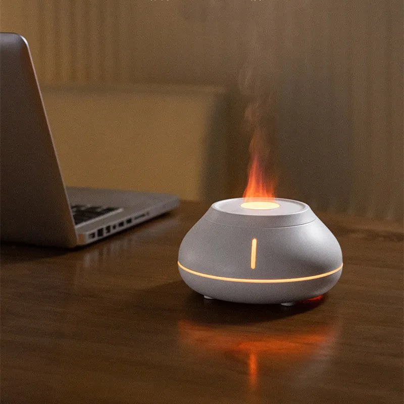 Desktop aroma diffuser humidifier with colourful flame effect in black resin finish