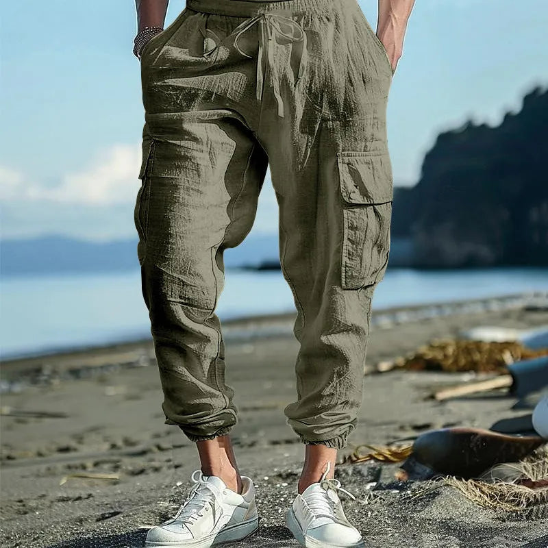 Men's casual ankle-tied linen trousers in Army Green colour showing multi-pocket design