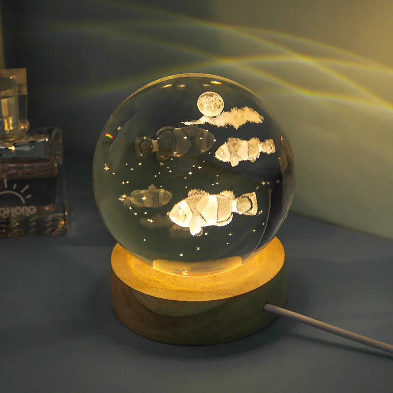 Transparent crystal ball night lamp with 3D carved jellyfish design, showing 6cm size on round base.