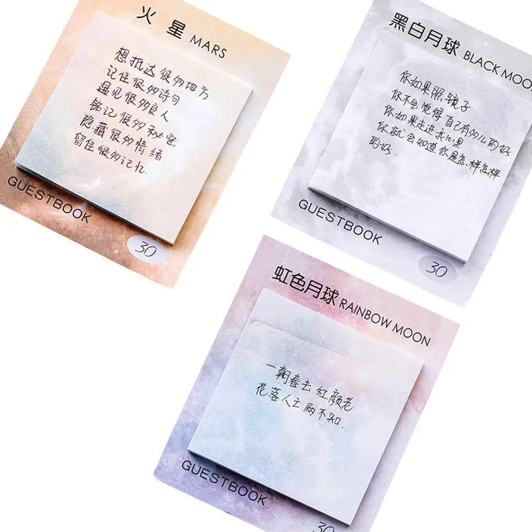 Square planet sticky notes pad showing celestial oil painting designs in six colour variations