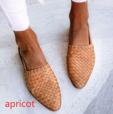 Baotou flat sandals with a buckle strap and pointed toe in multiple colour options.