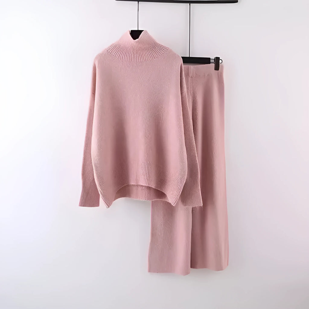 Women's beige acrylic sweater and wide-leg trousers casual two-piece set on a hanger.