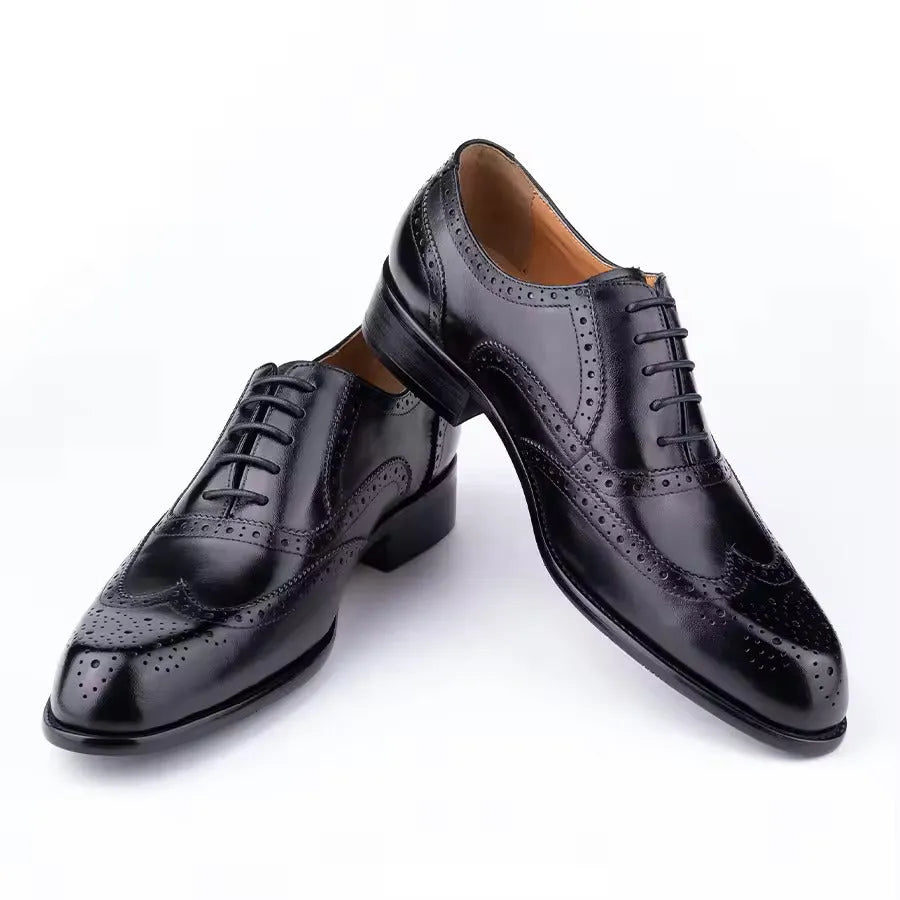 Men's purple Oxford shoes with hand-carved leather detailing and pointed toe