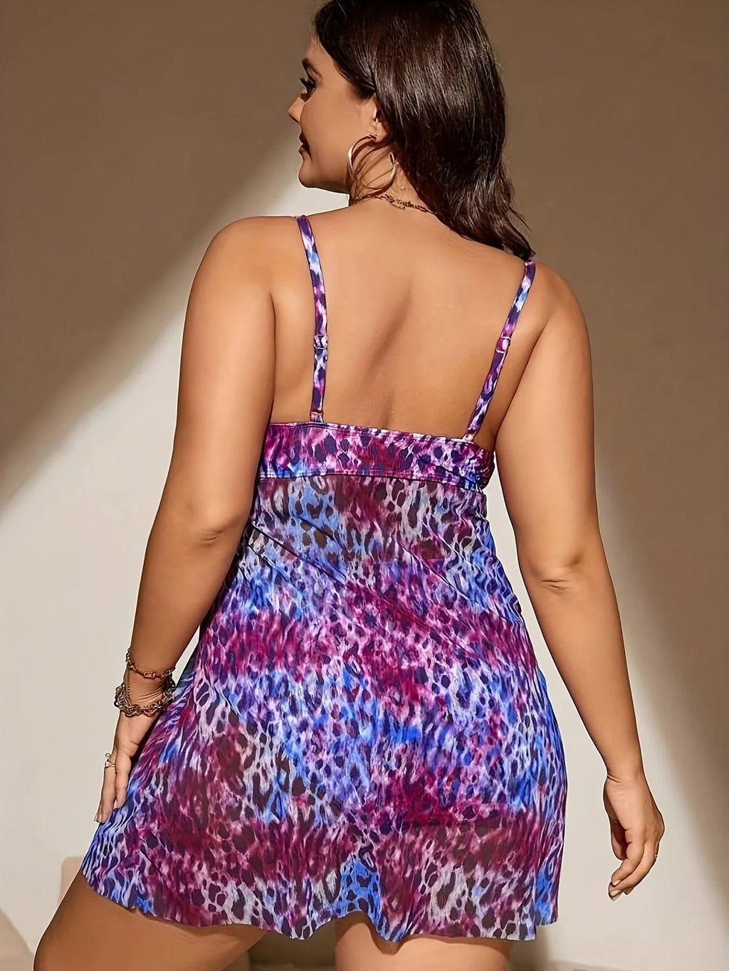 Plus size women's bikini set with a skirted bottom and sleeveless top in a choice of colours.
