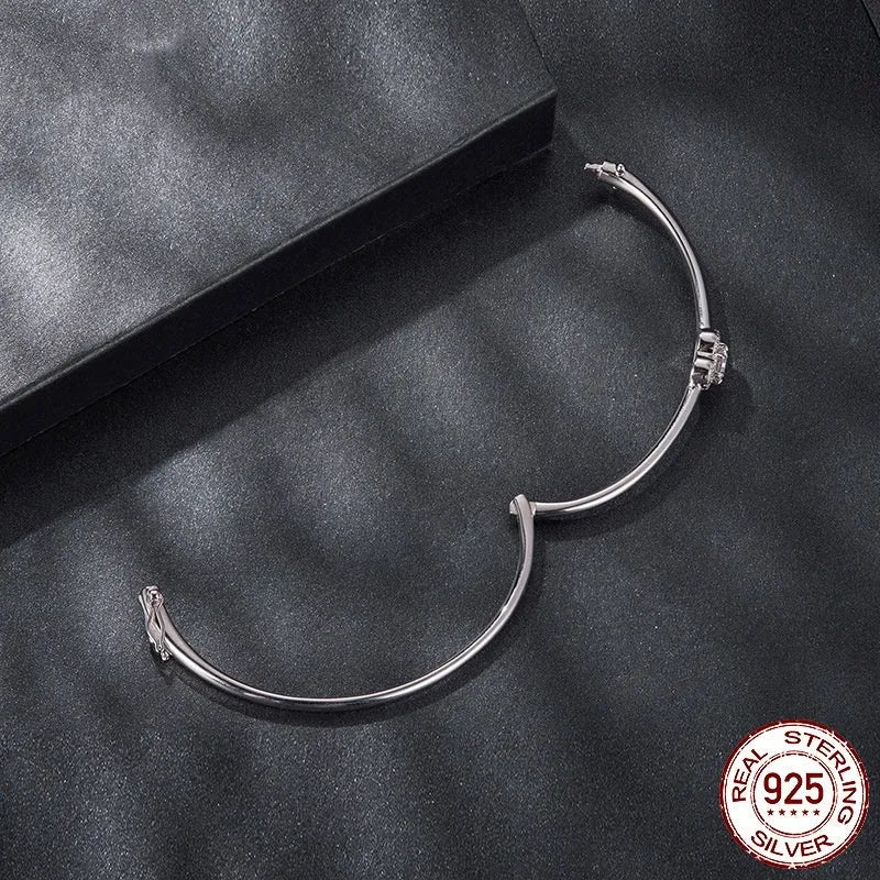 S925 sterling silver D-colour moissanite love bracelet on a plain background showing the chain and stone