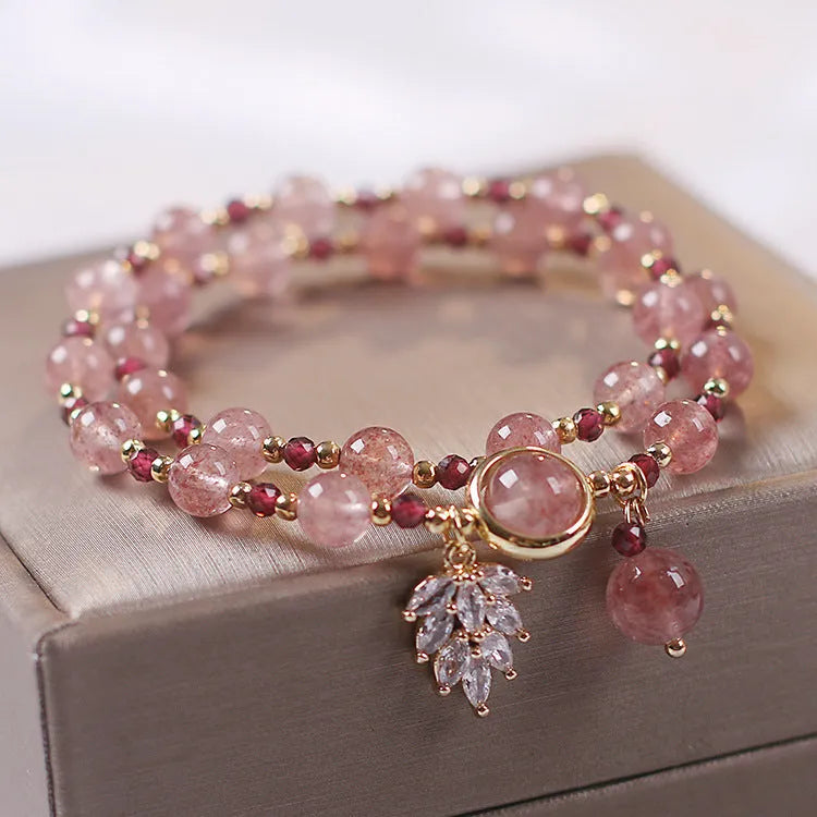 Double layer strawberry quartz bracelet with lucky cat charm in red cat's eye flowers colour