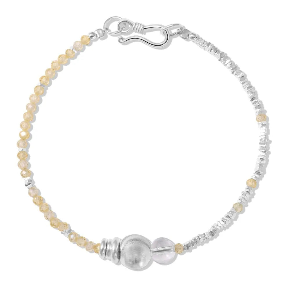 Women's 925 sterling silver brushed ball bead bracelet, round geometric design, electroplated silver finish, on neutral background