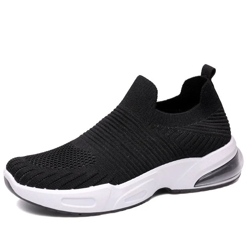 Slip-on breathable sock shoes in black, pink, khaki, and white with mesh lining and PVC sole.