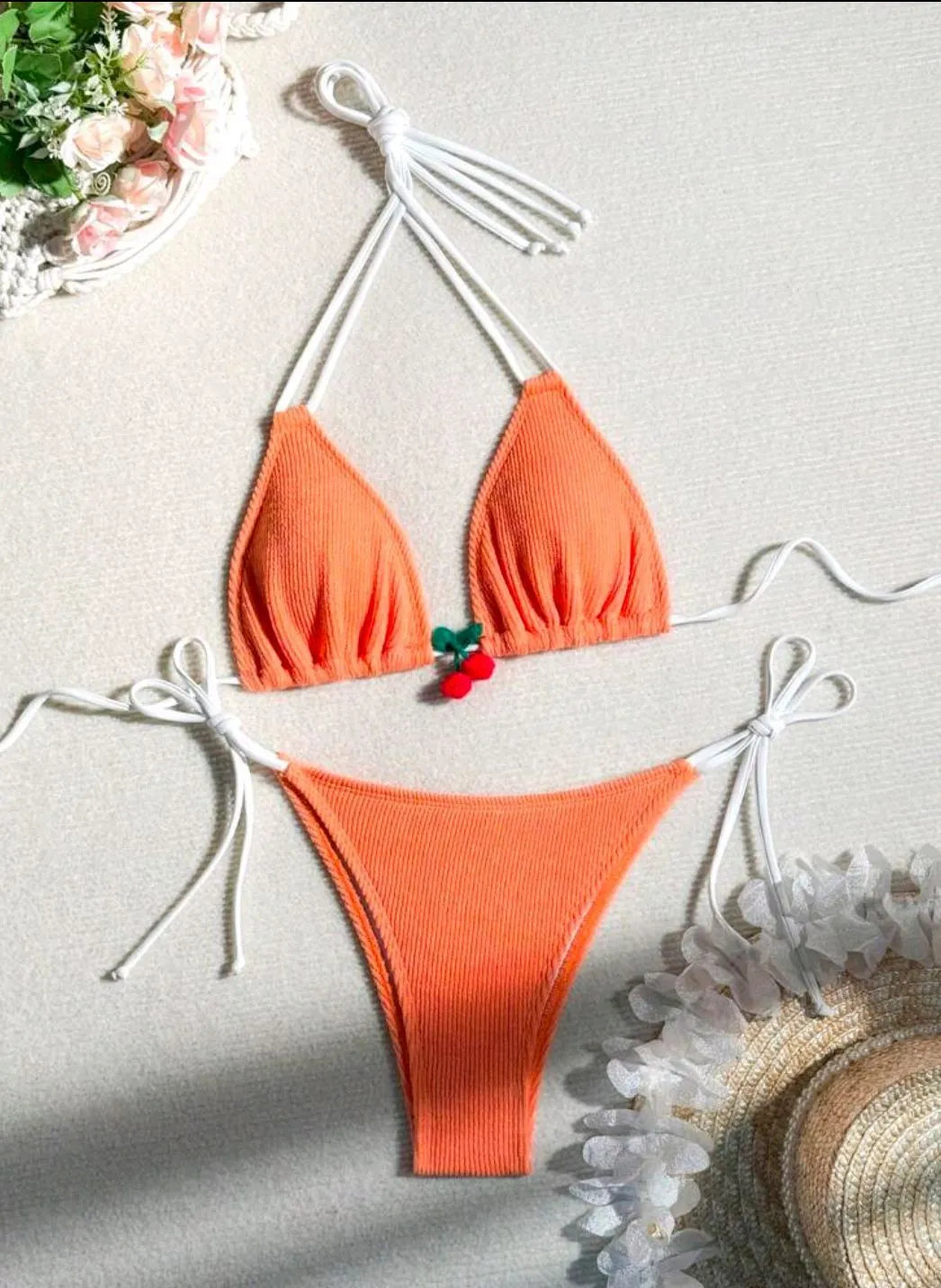 Solid colour nylon bikini briefs swimsuit in briefs style on a mannequin.