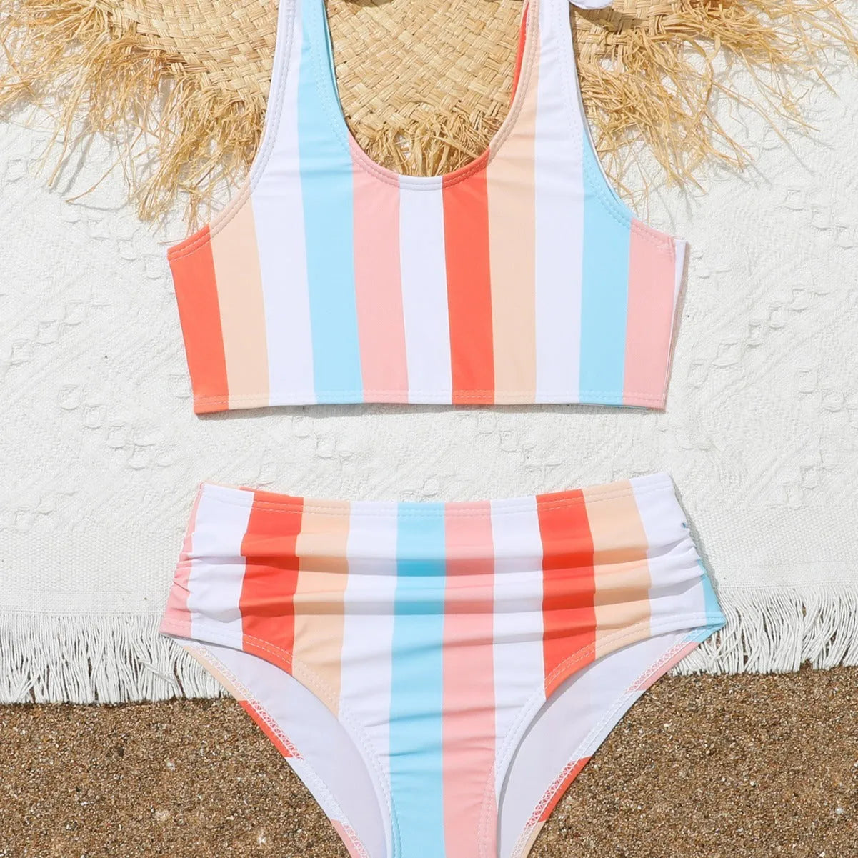 Girls' plaid print two-piece swimsuit set with bra top and briefs for swimming.