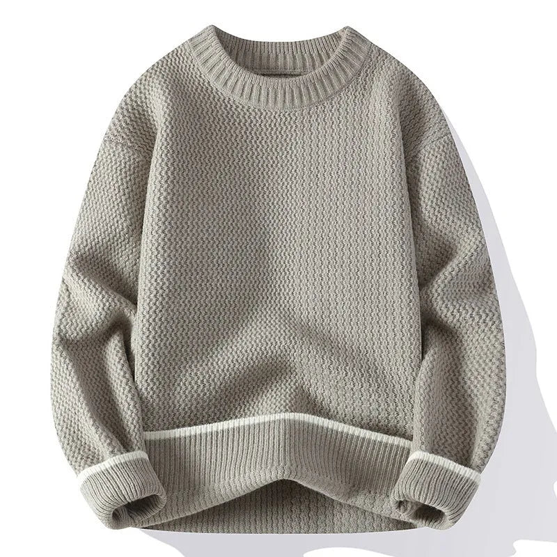 Men's loose fit round neck pullover sweater in grey, shown on a model