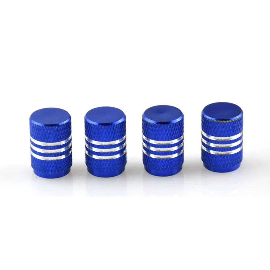 Set of stainless steel car tyre valve caps in multiple colours including red, blue, black, and silver.
