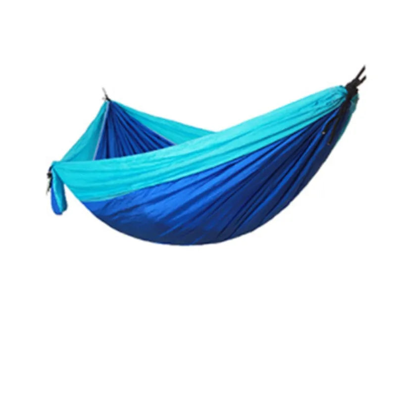 Double widened camping hammock 275x140cm in 210T nylon parachute fabric with steel buckles and ropes, shown outdoors in a garden setting