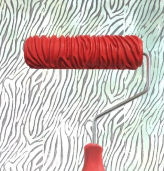 Red handled 7 inch texture paint embossing roller for creating relief patterns on walls.
