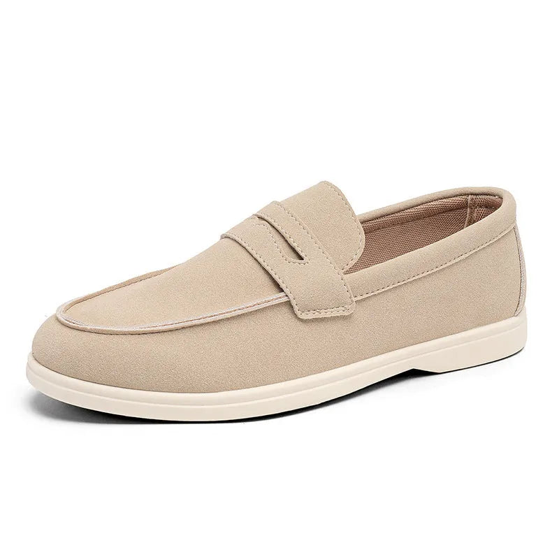 Men's suede leather slip-on casual shoe in a solid colour with a round toe and low flat heel.