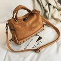 Soft PU women's casual shoulder tote bag in black with zipper and large interior.