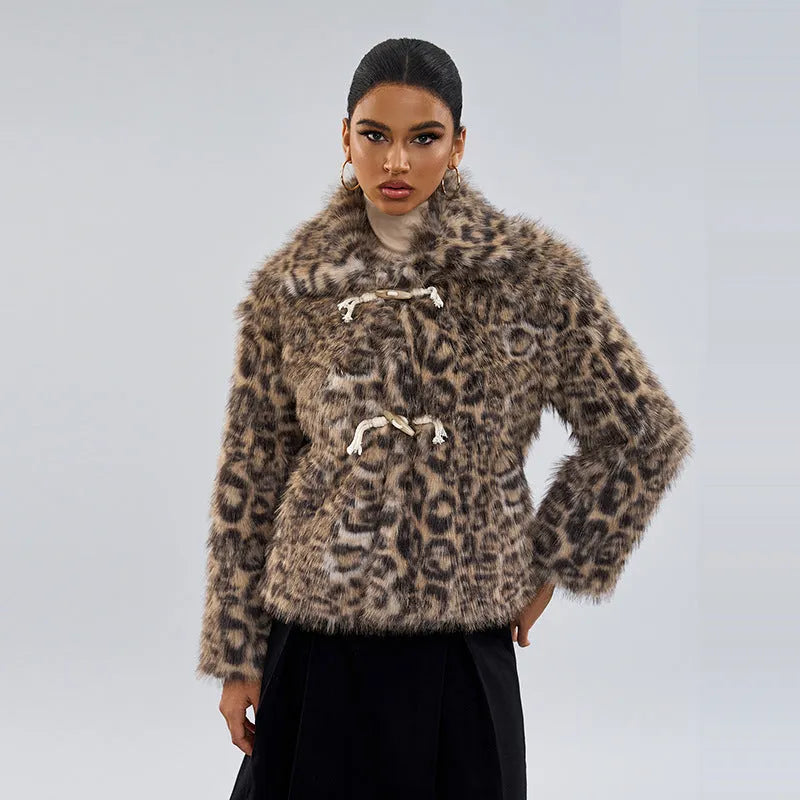 Women's leopard print coat with a buckle lapel on the collar.