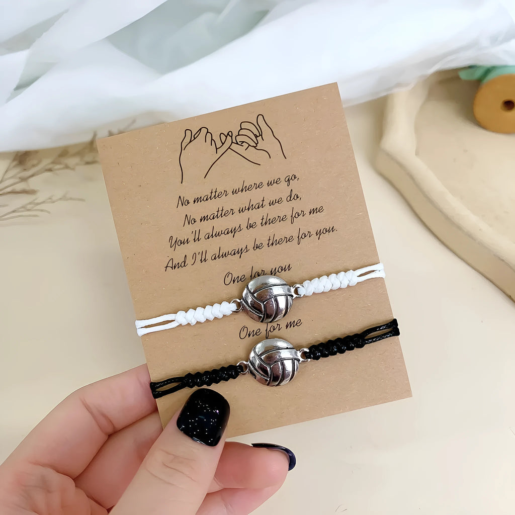 Black and white mixed colour alloy electroplated sports bracelet with geometric square shape on neutral background