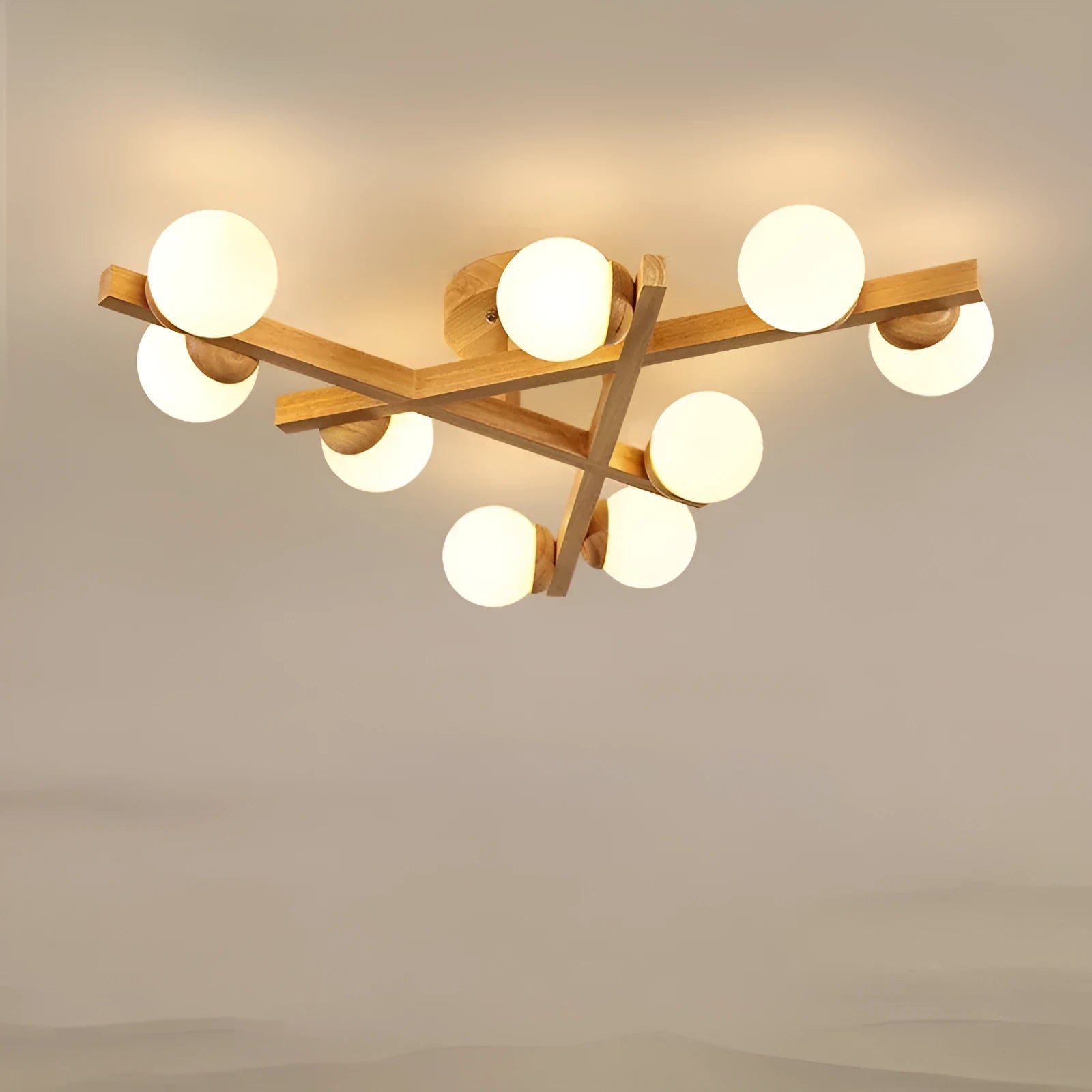 Wooden style modern Nordic ceiling light with three heads, installed in a living room.