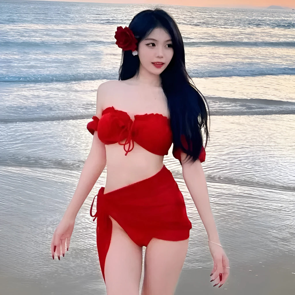 Red women's bikini swimsuit with puff sleeve skirt top and solid colour briefs