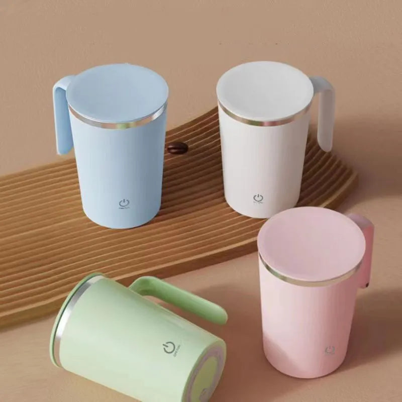 White automatic electric mixing cup with USB cable on a table.