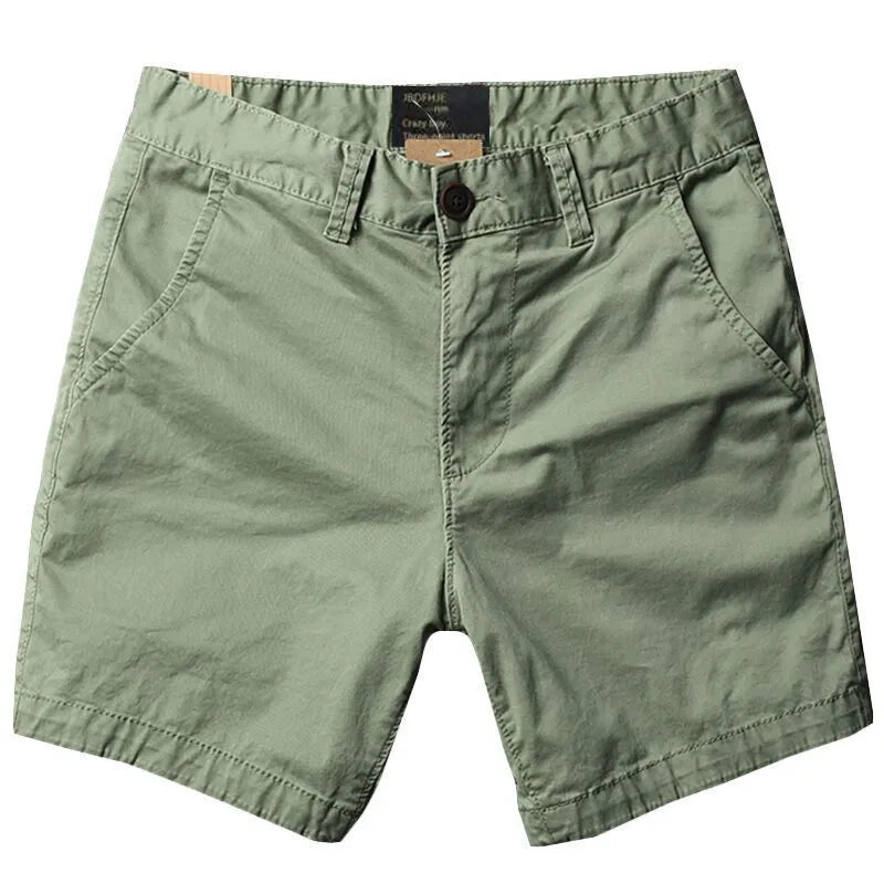 Men's loose fit cotton shorts in a straight-leg style with a zipper fly, shown in a camouflage print colour.