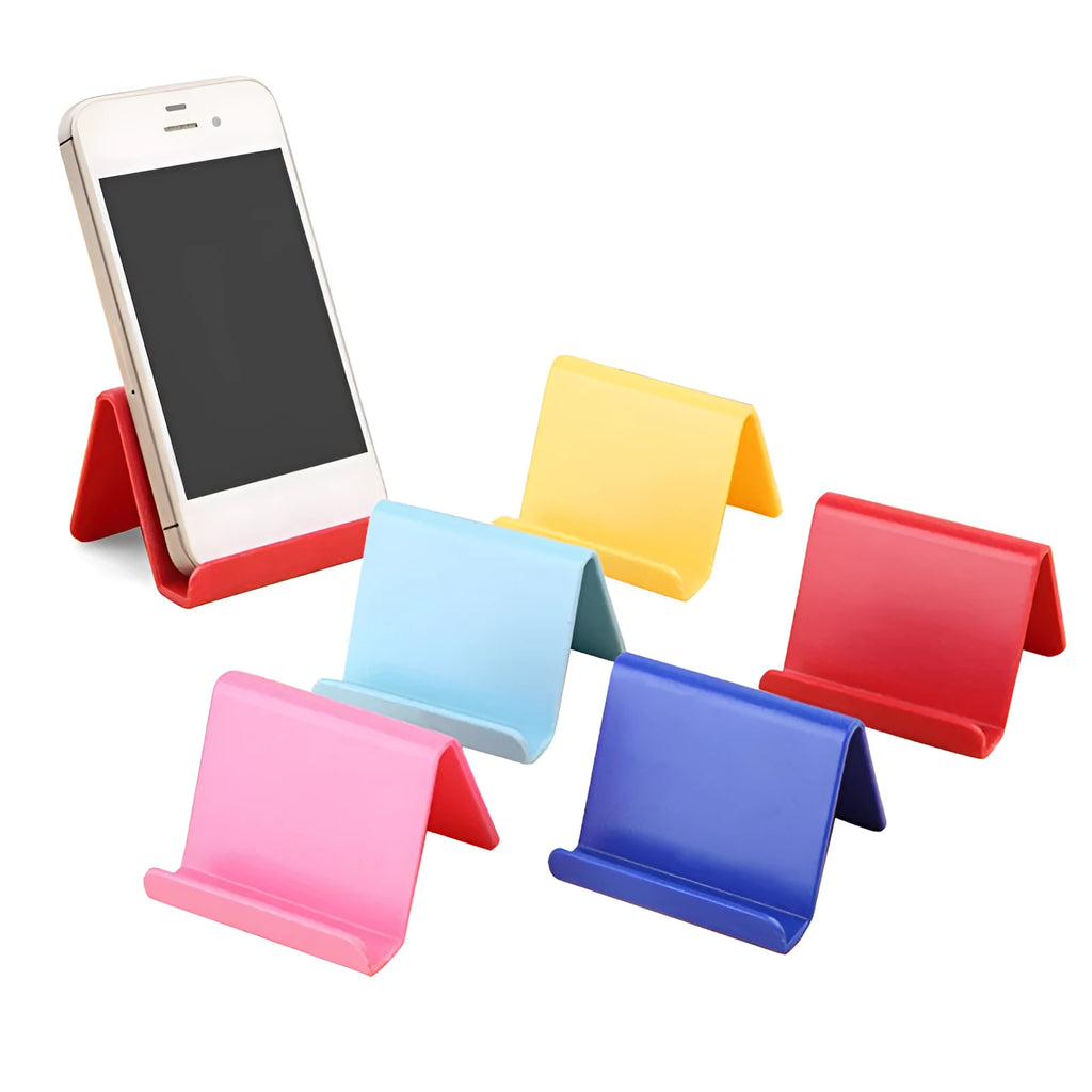 Small plastic mobile phone stand in blue, size 6x4.5cm, on a wooden desk