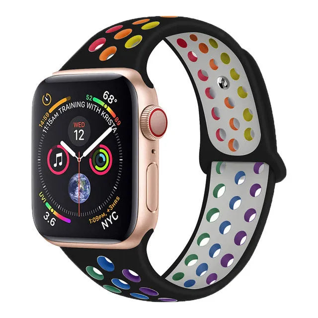 Black silicone sports wristband with a single buckle, shown next to white and rainbow colour options.