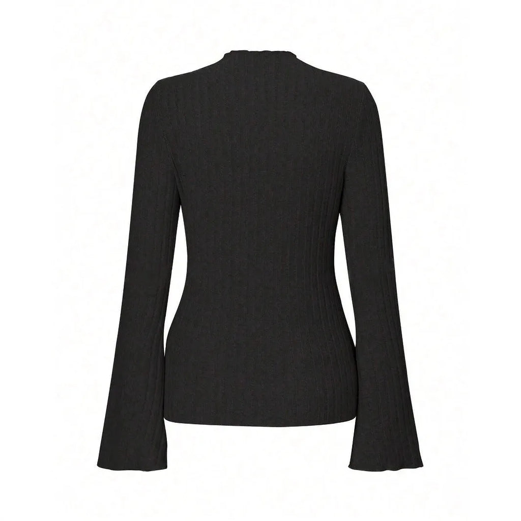 A black long sleeve slim fit top with round neck and lantern sleeves on a model.