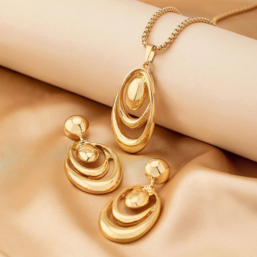 Fashion creative multi-ring drop shape earrings necklace three-piece set in golden alloy for women