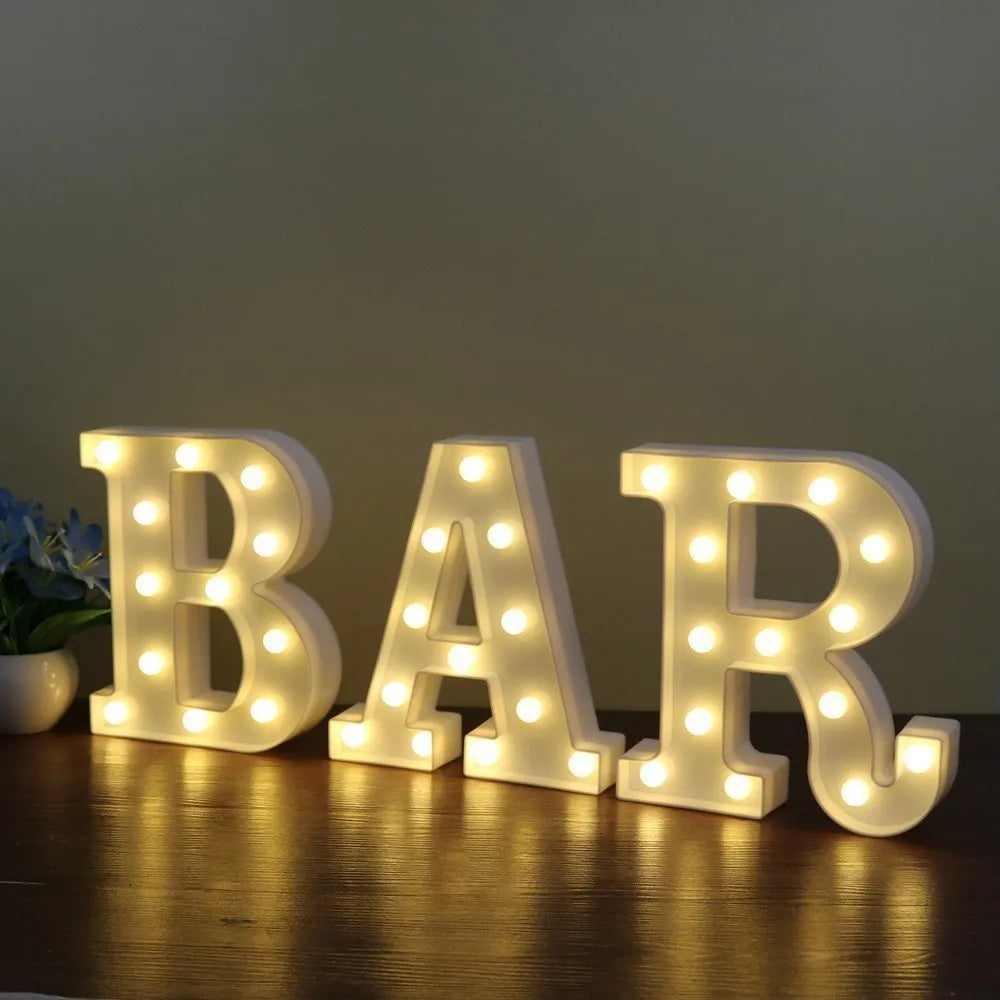 White plastic LED marquee sign letter lamp, 22 cm high, with warm white glow and battery compartment