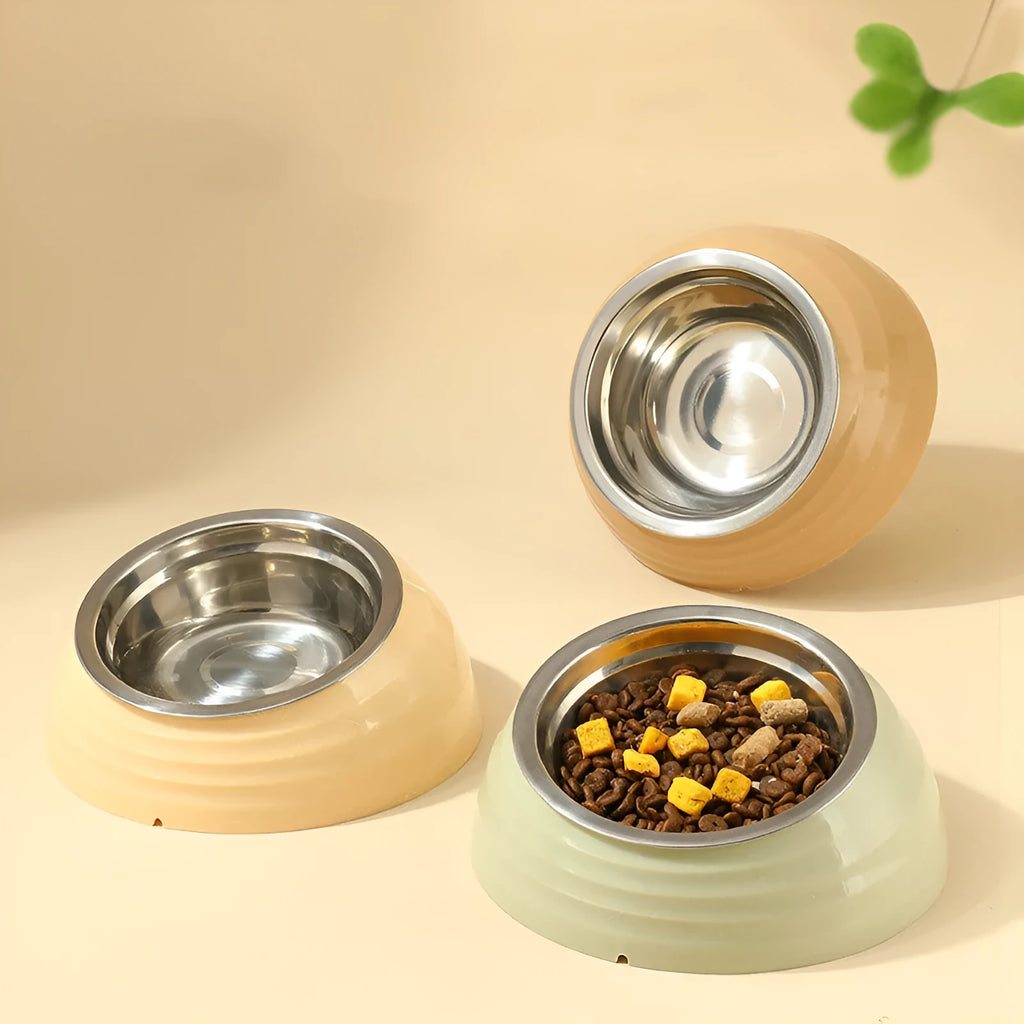 A single stainless steel cat bowl made of plastic, shown in beige, brown, and light green.