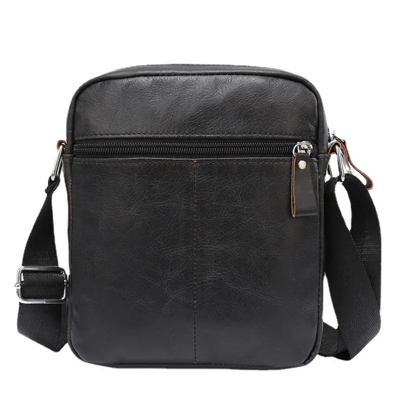 Black genuine leather messenger bag for boys with crossbody strap and sewing line detailing