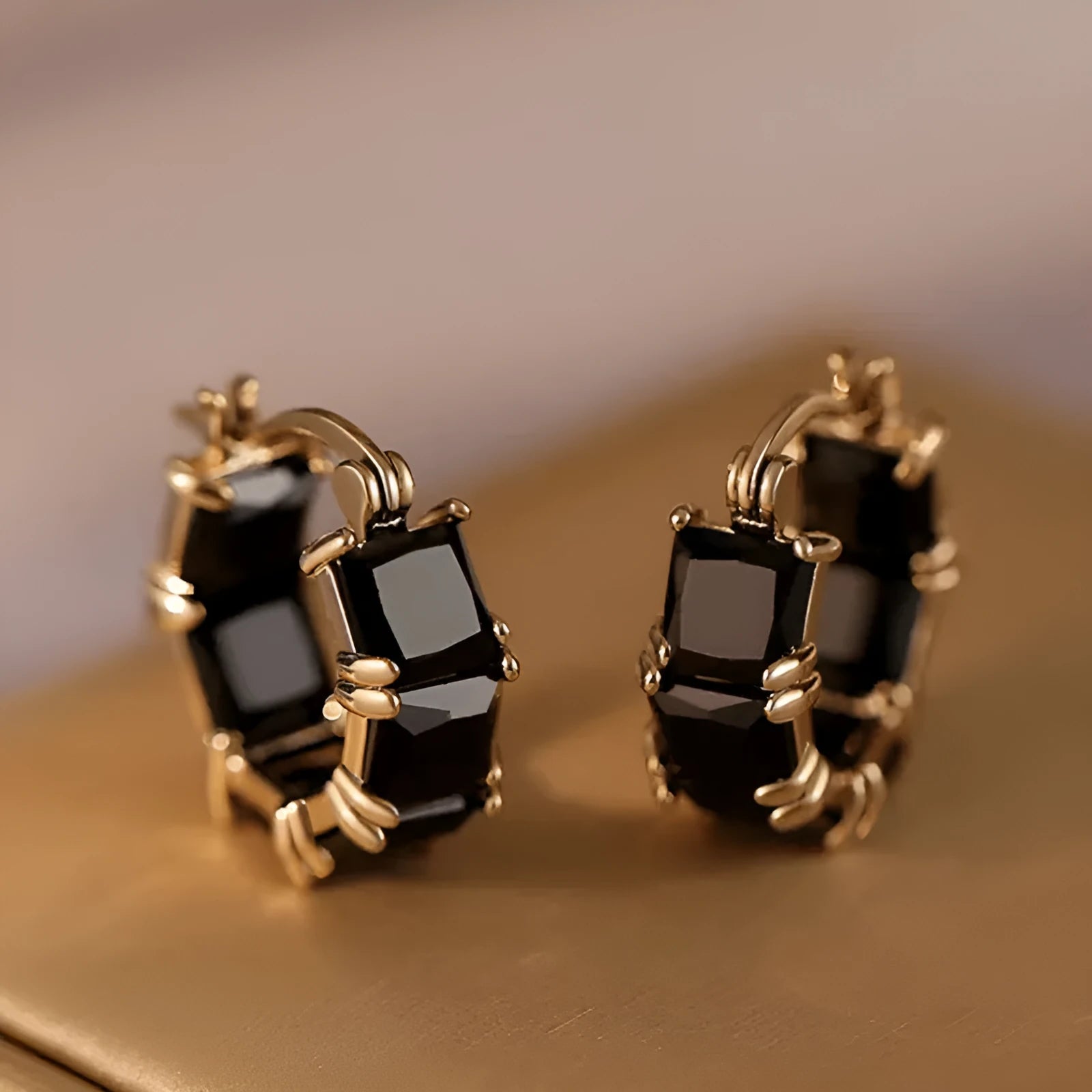 Women's black zirconium geometric drop earrings with gold electroplated U-shaped design