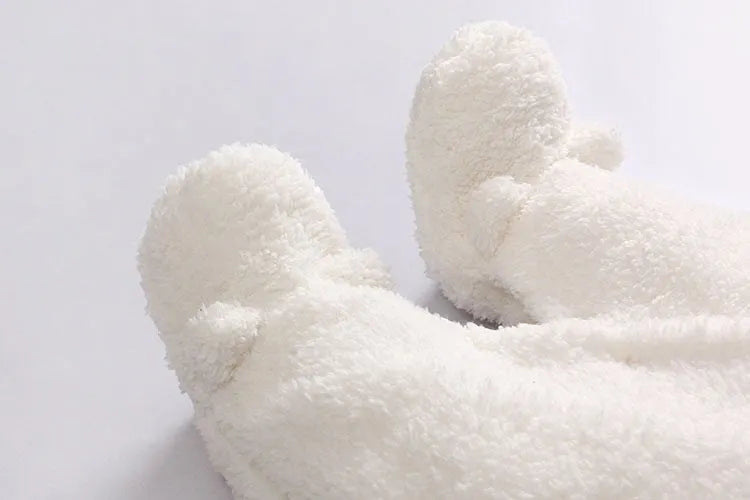 Cotton lamb baby winter romper suit in brown, showing long sleeves and feet covering.