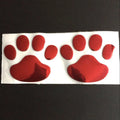 PVC car sticker pair featuring hand-shaped brush dog footprints design in choice of colours