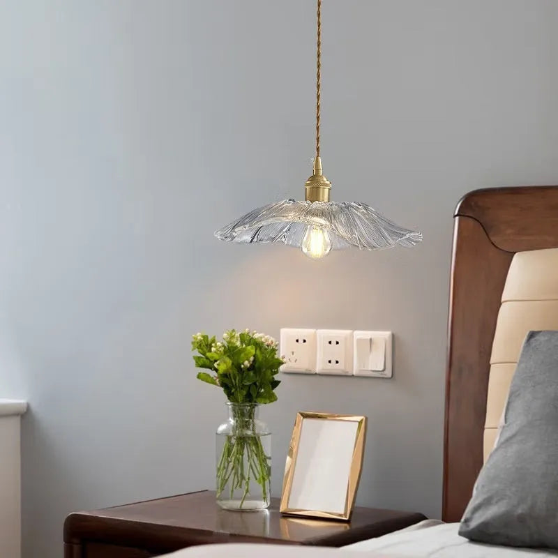 Nordic Japanese style lotus leaf shaped ceiling or pendant lamp with iron frame and glass shade.